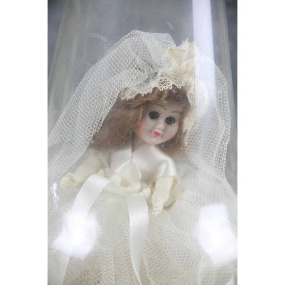 Dated, vintage A & H hard plastic bride doll in original clear dome, circa 1960s